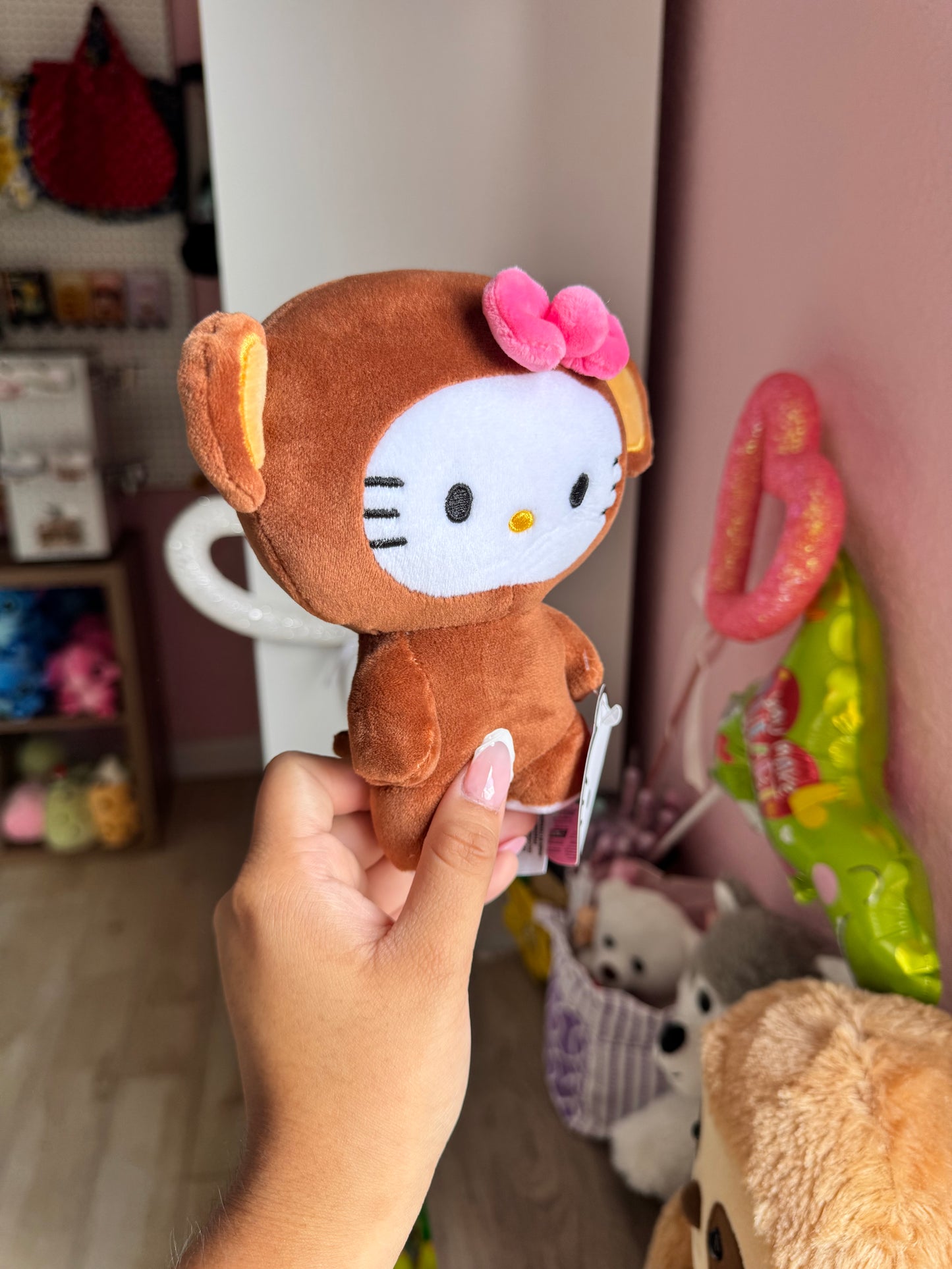 Hello kitty in monkey costume