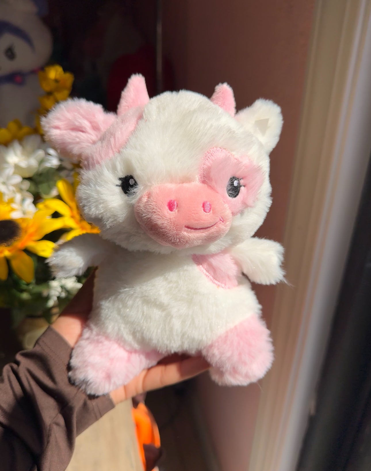 Pink and white cow plushie