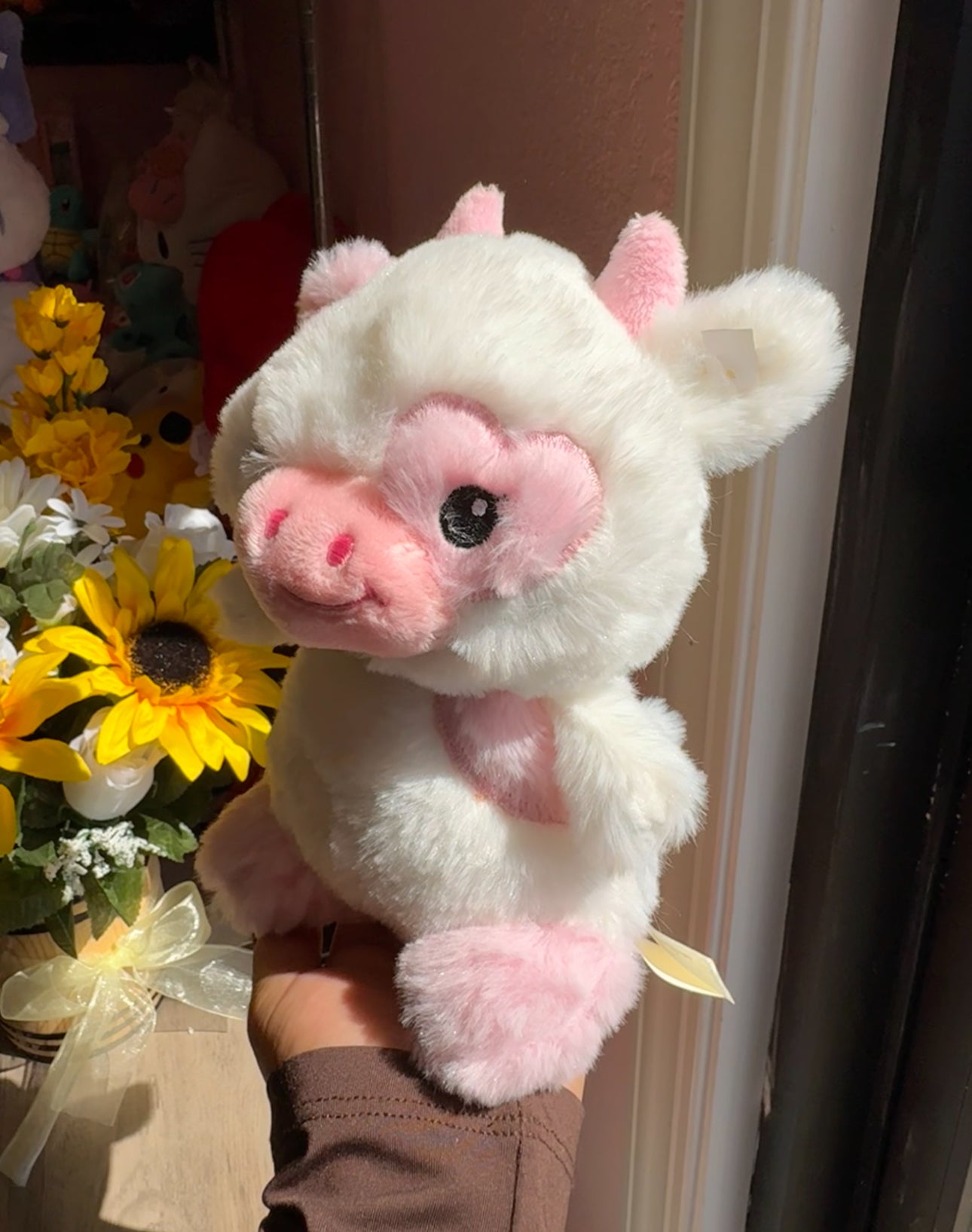 Pink and white cow plushie