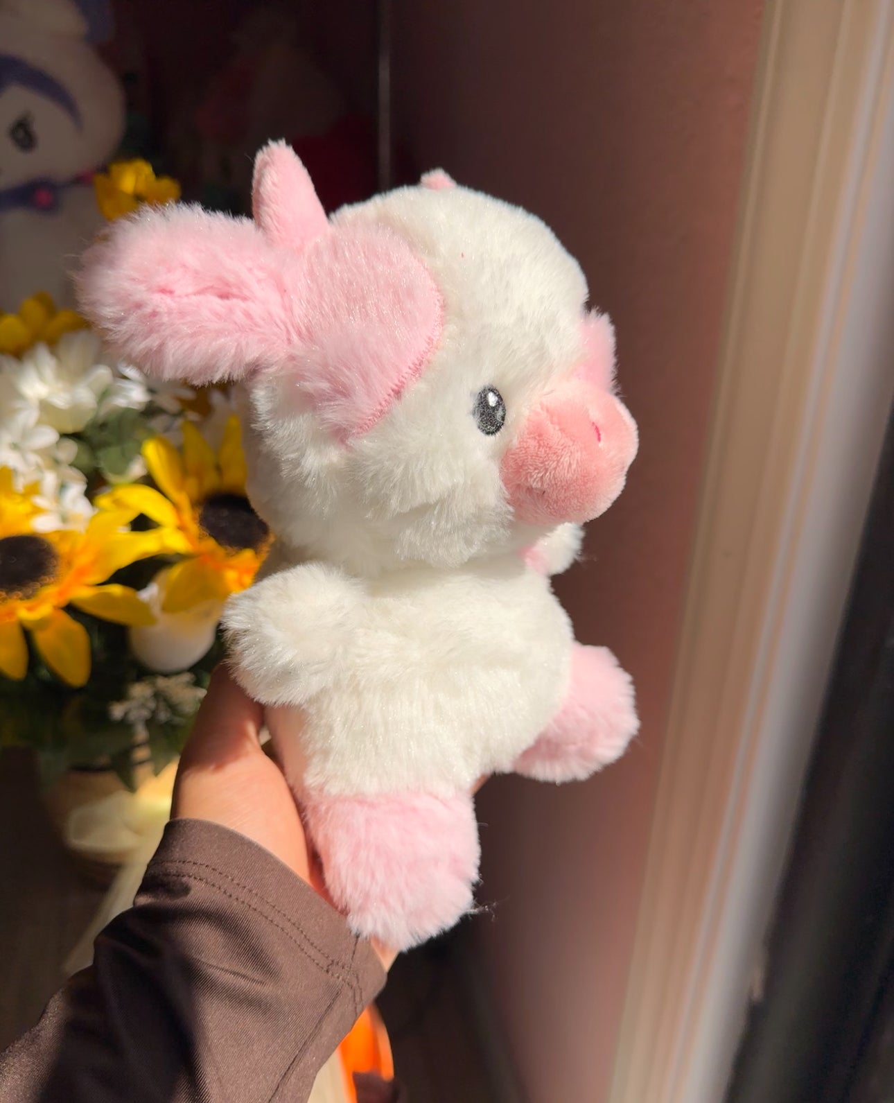 Pink and white cow plushie