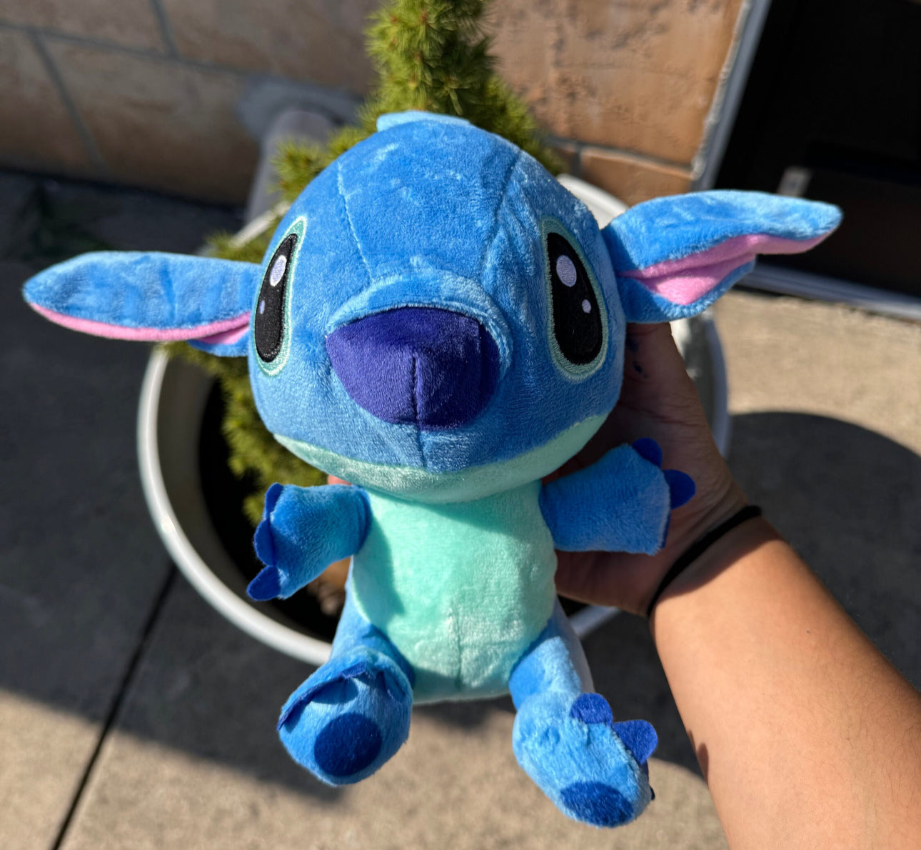 Stitch and angel plushies