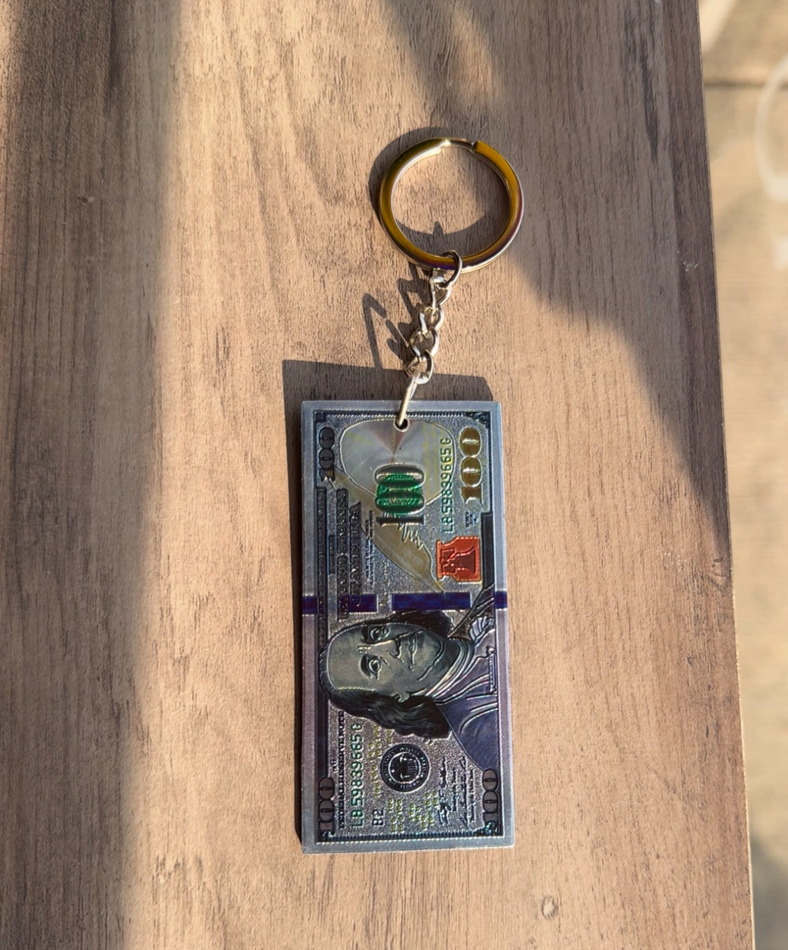 100 bill keychain