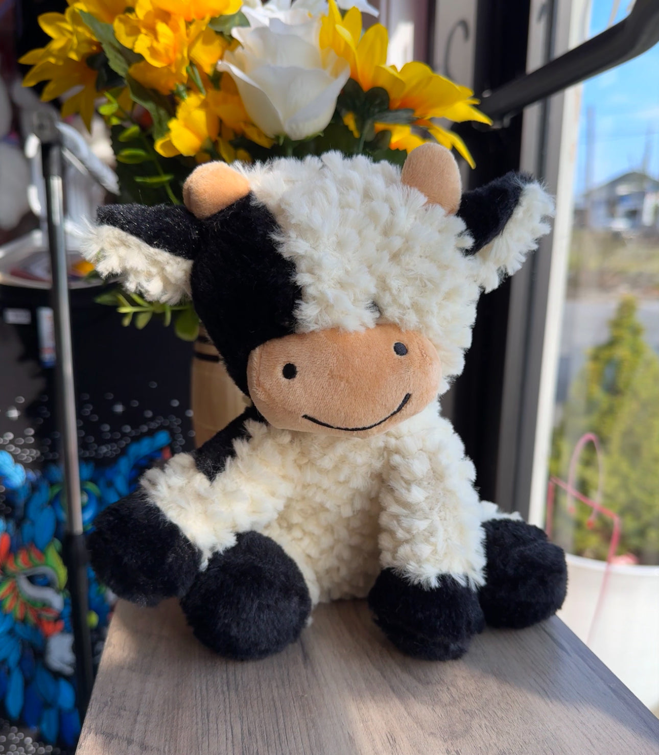 Black and white cow plushie