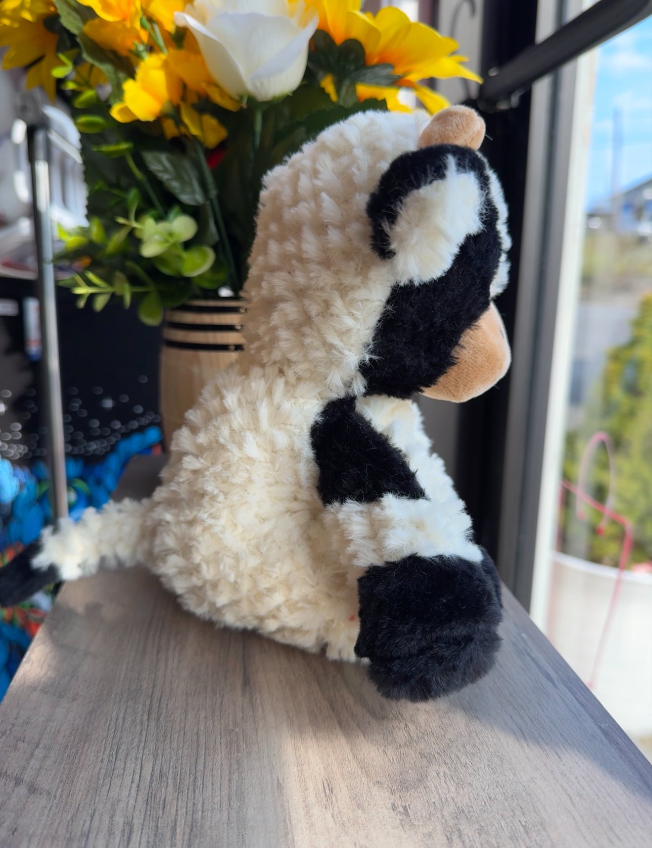 Black and white cow plushie