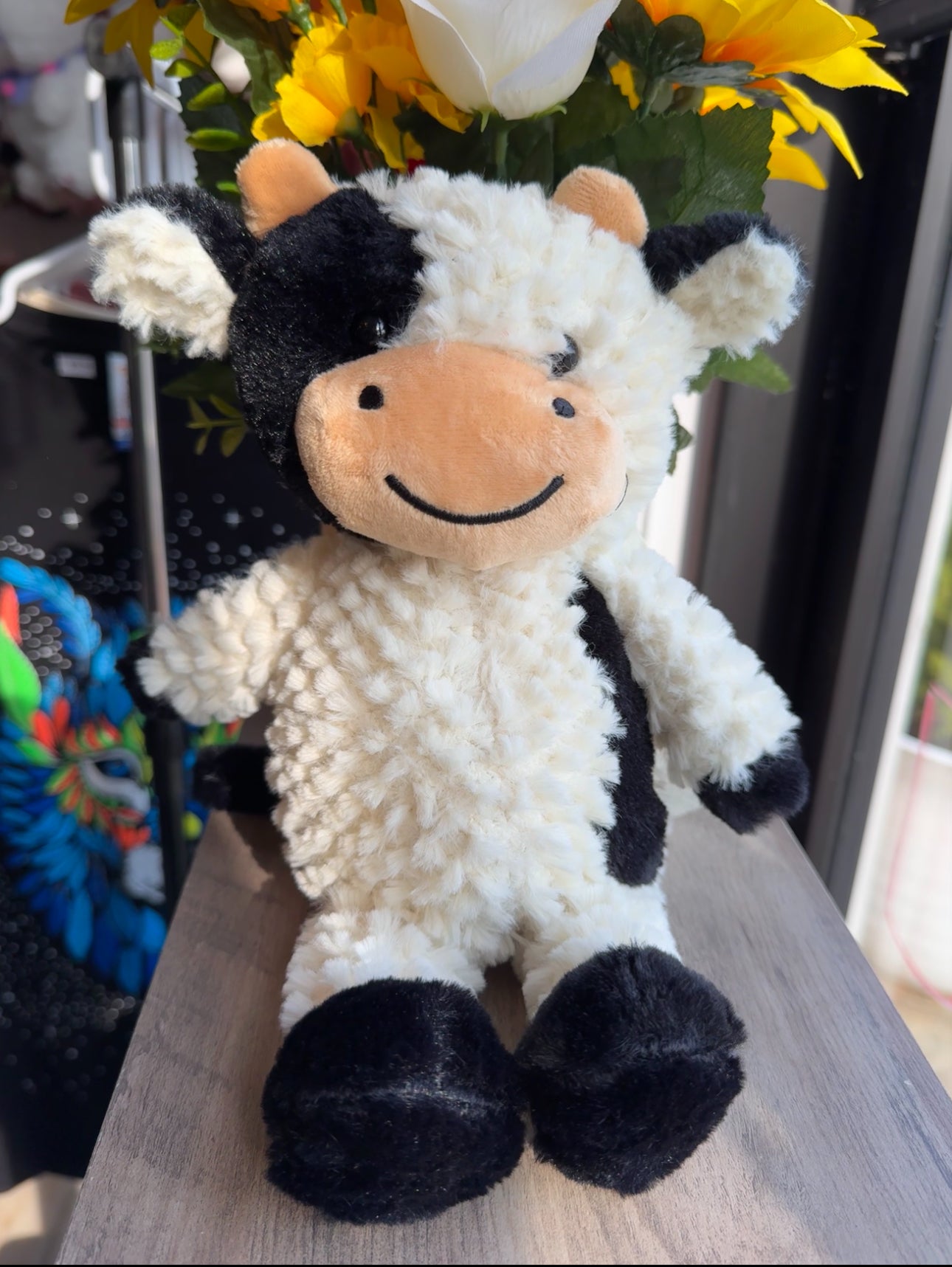 Black and white cow plushie