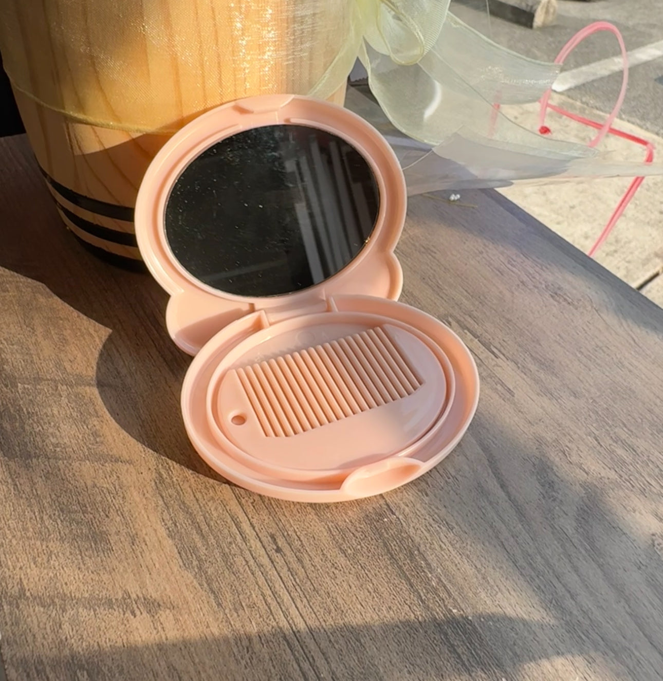 Mini mirror with small comb
