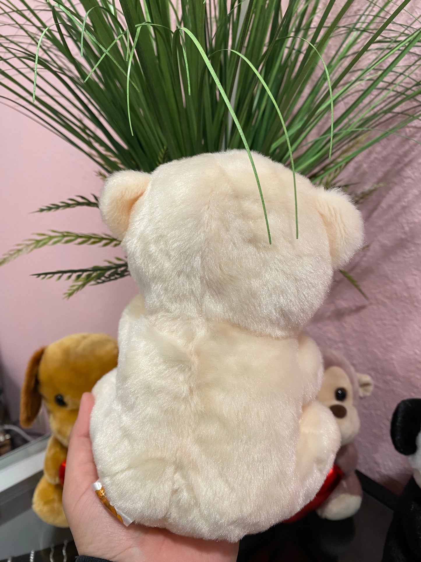 Plushies holding heart