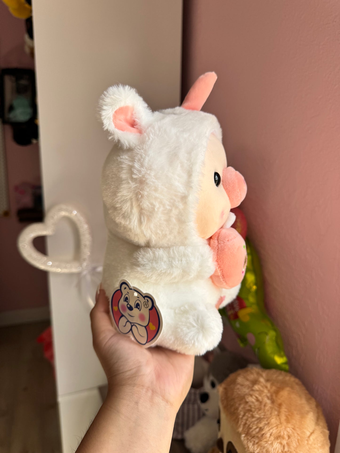 Baby pig in costume with bubble tea