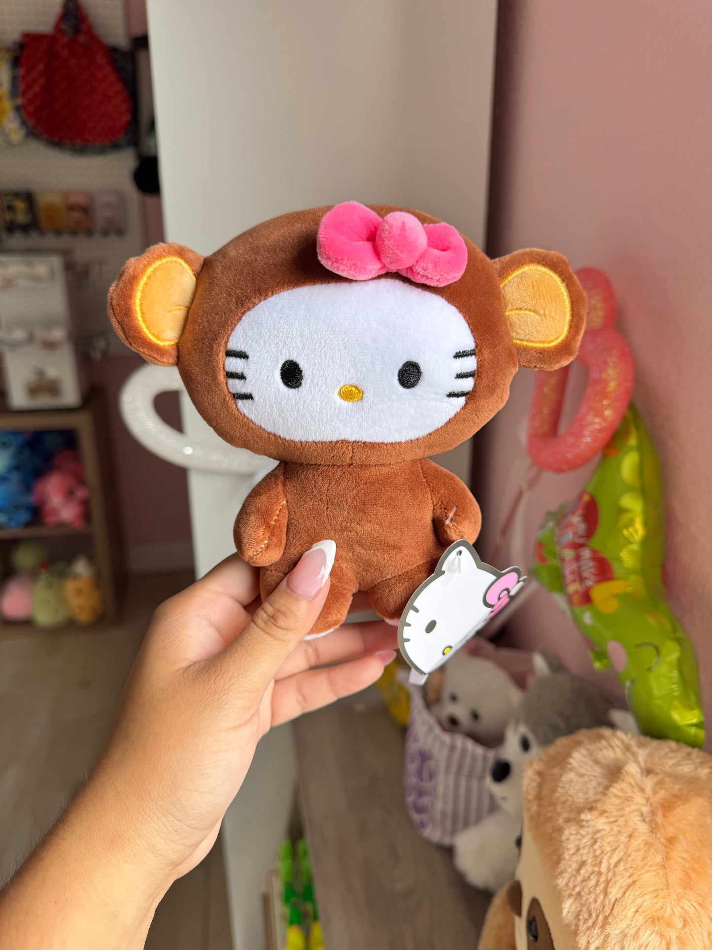 Hello kitty in monkey costume